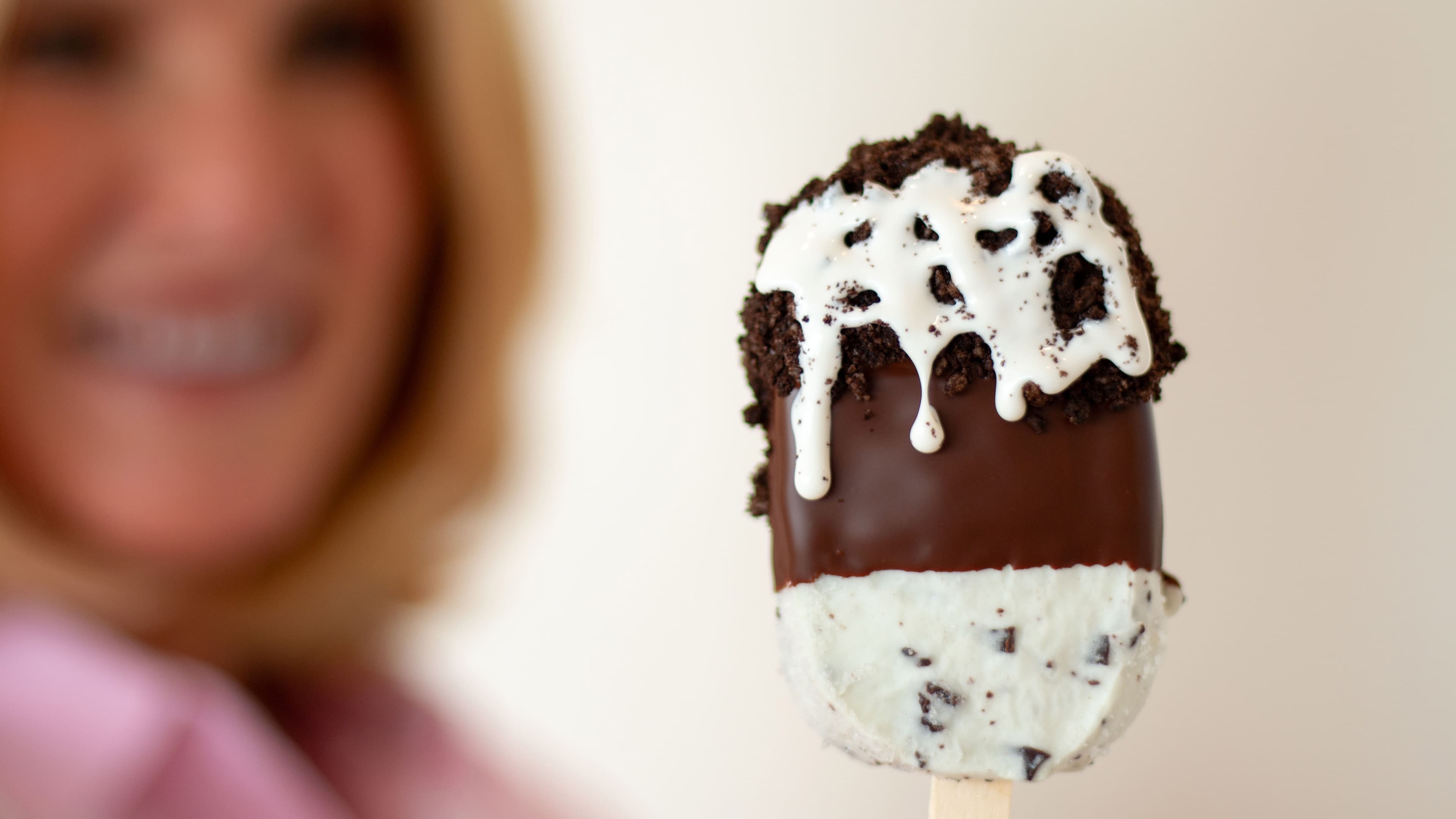 A cookies-and-cream dipped bar